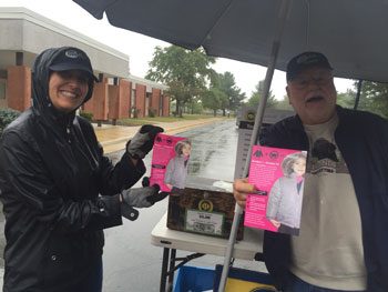 Handing out coat drive flyers to the community